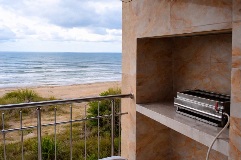Balcony with BBQ grill and sea view
