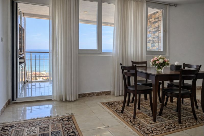 Dining spot by the balcony with sea view