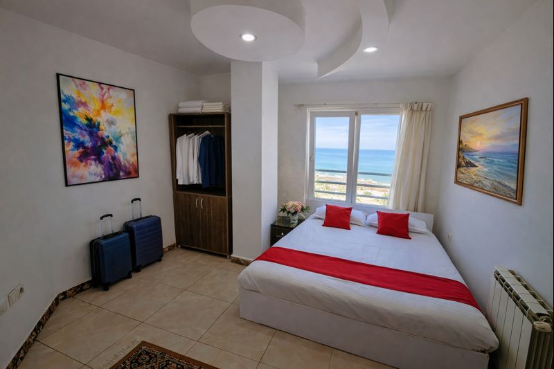 Bedroom with sea view and large bed